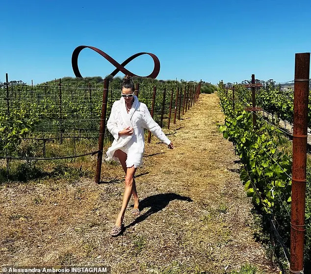 Alessandra took time to visit some of the wineries in the area, and posed for a snap while standing in a vineyard