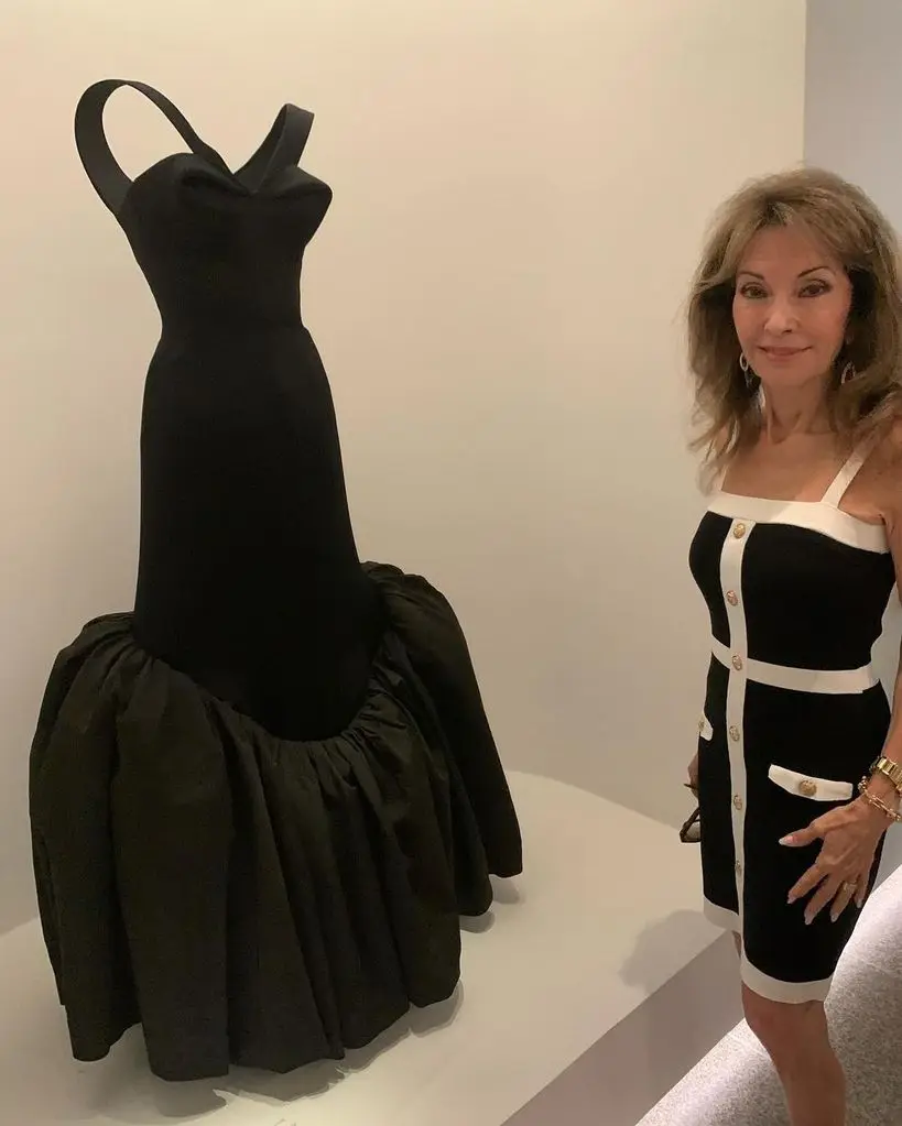 Susan Lucci poses in a mini-black clothing.