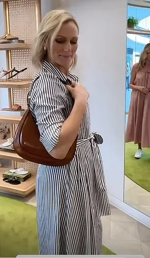 Six months later at the Pacific Fair shopping centre in Australia she dressed it down with a different Aspinal of London crossbody bag and a pair of white trainers