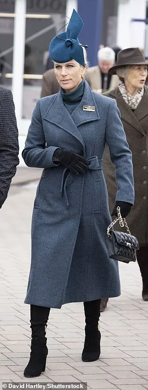 Zara looked warm and stylish in this teal  Rebecca      Vallance wrap coat