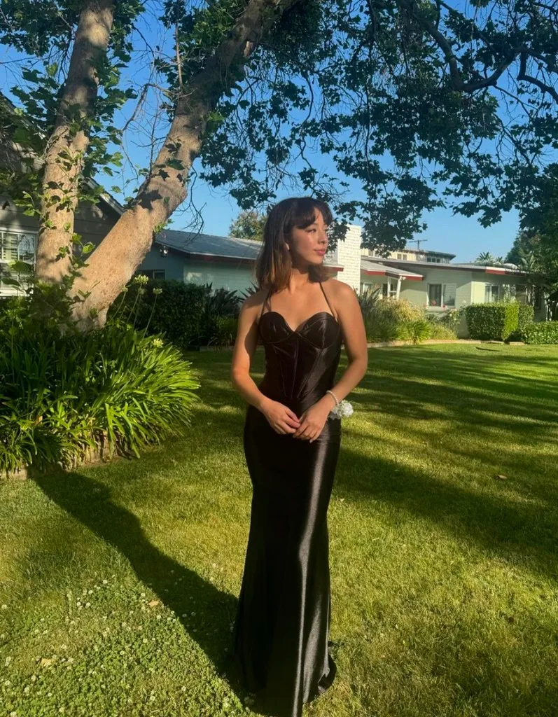 Photo shared on Instagram June 2024 by Aubrey Anderson-Emmons, who starred as Lily on Modern Family, of her look for prom.