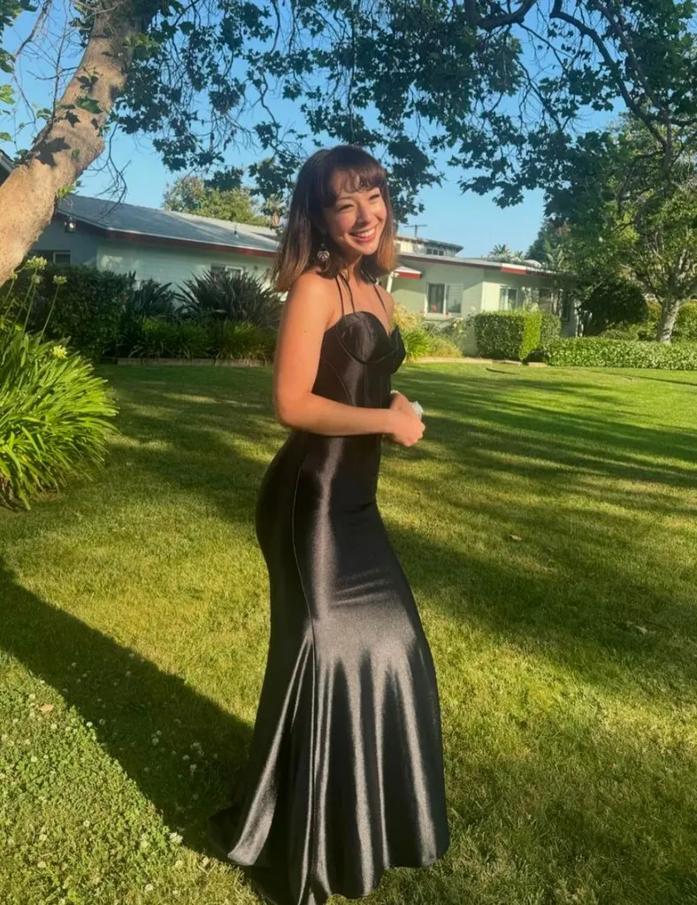 Photo shared on Instagram June 2024 by Aubrey Anderson-Emmons, who starred as Lily on Modern Family, of her look for prom.