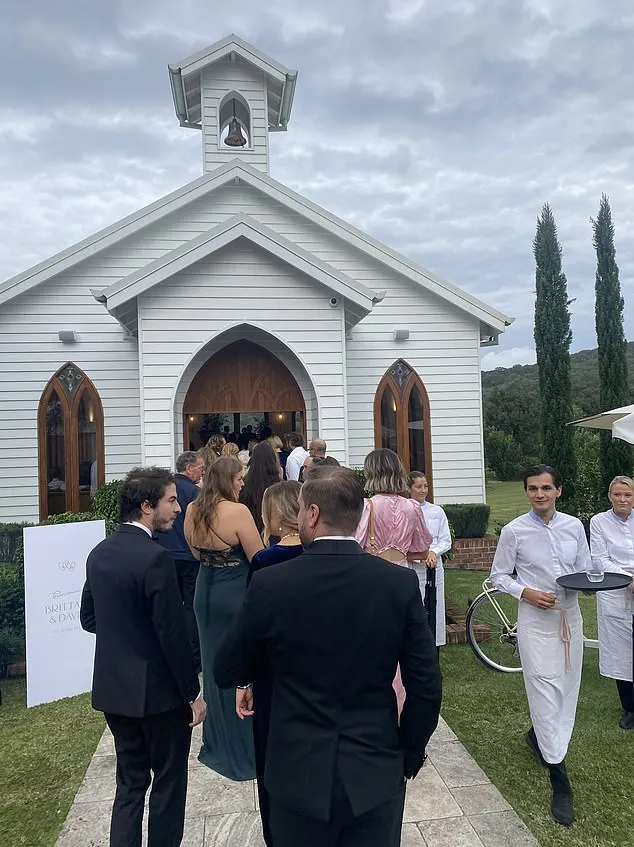 Pictured: Guests making their way into the chapel on Saturday afternoon, before the ceremony