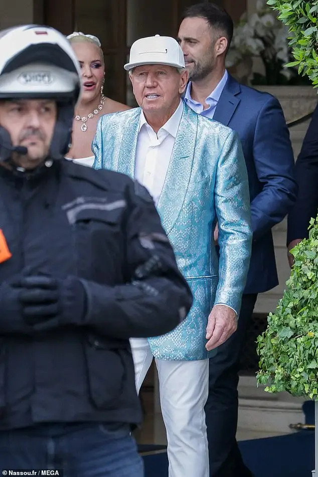 Nancy's husband and Paige's father, former basketball player Bill Laurie, 71, was also there; for his part, he wore a metallic blue suit and a white cap