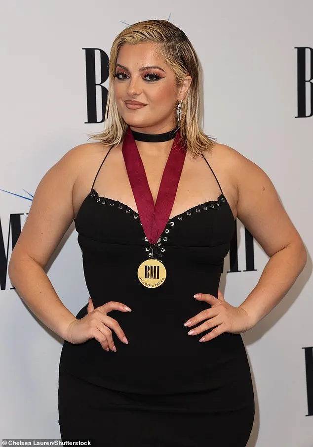 Rocking an edgy 'wet-hair' look, Rexha oozed confidence in front of cameras before accepting an award for her songwriting contributions