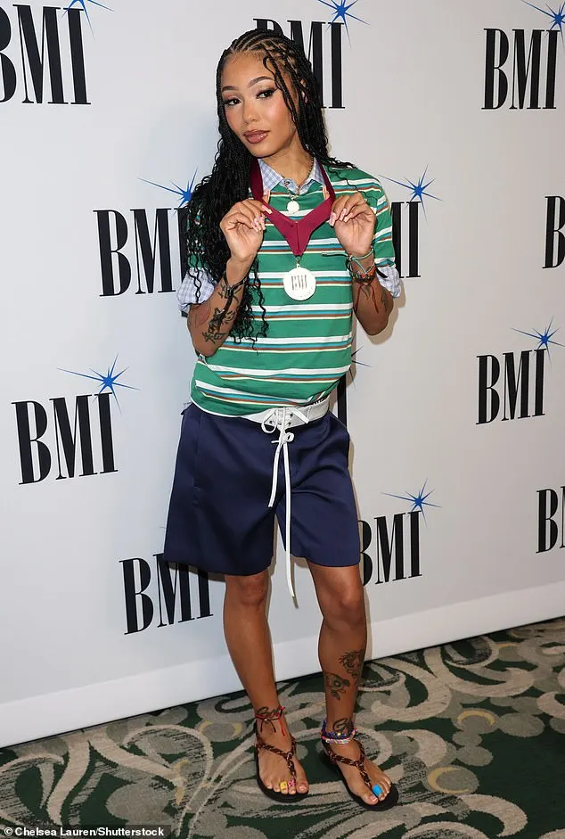 Boston-born rapper/singer Coi Leray showed off her medal as one of the night¿s honorees