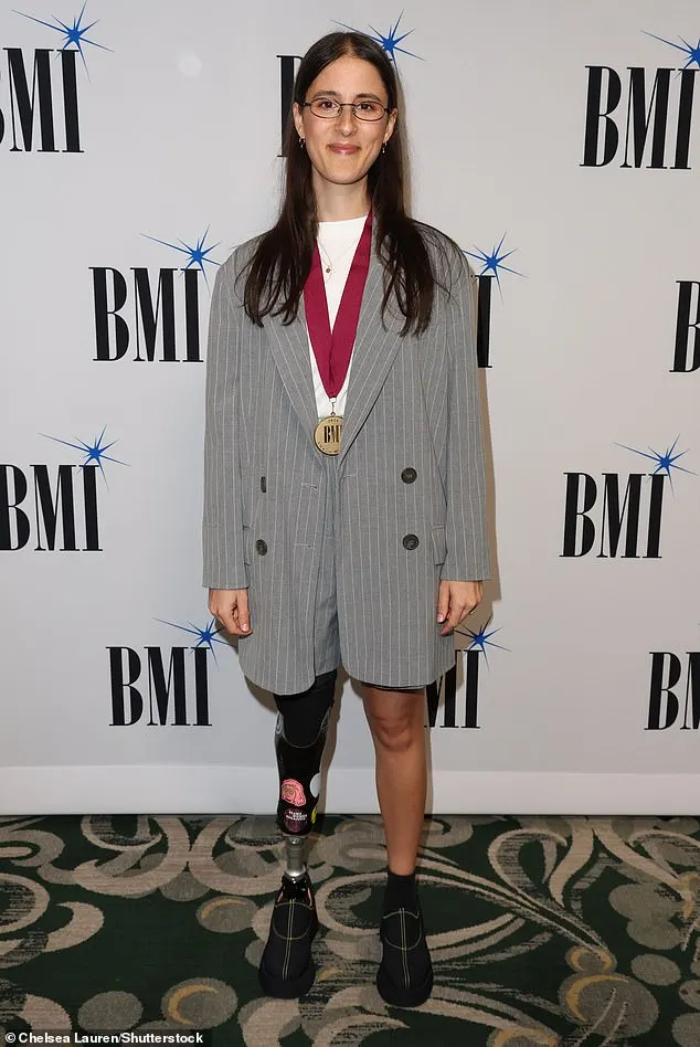 Australian songwriter Sarah Aarons, 29 ¿ who has written for Miley Cyrus and Zedd ¿ cut a preppy figure in an oversized gray pinstripe jacket and shorts