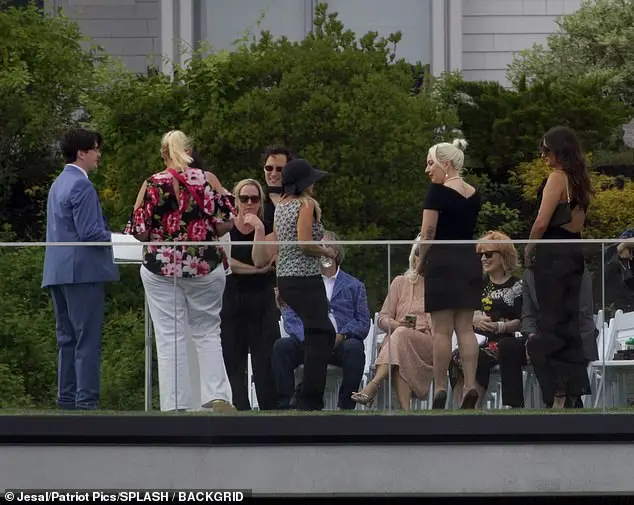 She laughed along with other wedding guests and looked out at the Atlantic Ocean