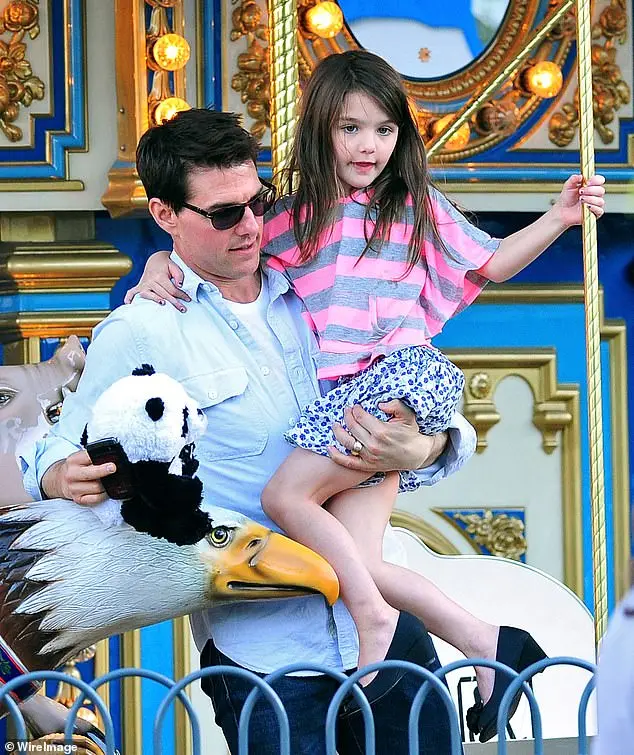 Tom has all but been exiled from his youngest child's life for many years - a bitter rift that stems in large part from Katie and Suri's decision to cut ties with his controversial Scientology faith (Tom and Suri seen together in 2011)