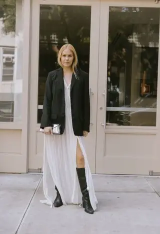 Hanna Flanagan wearing a flowy white dress and blazer.