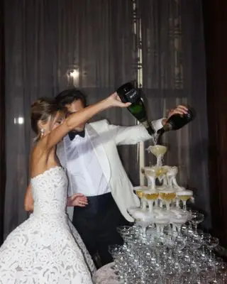 Couple doing a wedding day toast.