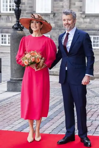 Queen Mary of Denmark outfit repeats in a pink andrew gn dress in Copenhagen