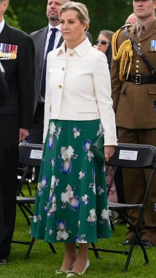 Duchess Sophie wearing a white jacket and green floral dress attends the UK National Service of Remembrance on 6th June 2024