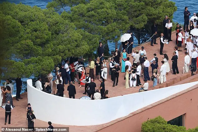 Guests were seen gathering ahead of the fashion show in Italy on Monday afternoon