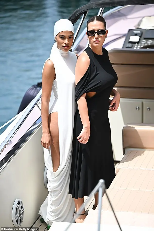 Tina wore a striking white ensemble while Adèle looked elegant in a black cut-out dress