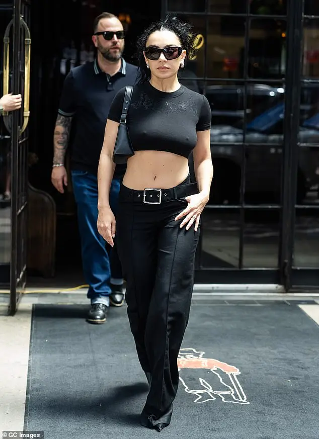 She struck a confident pose as she made her way through the big city in the all-black outfit