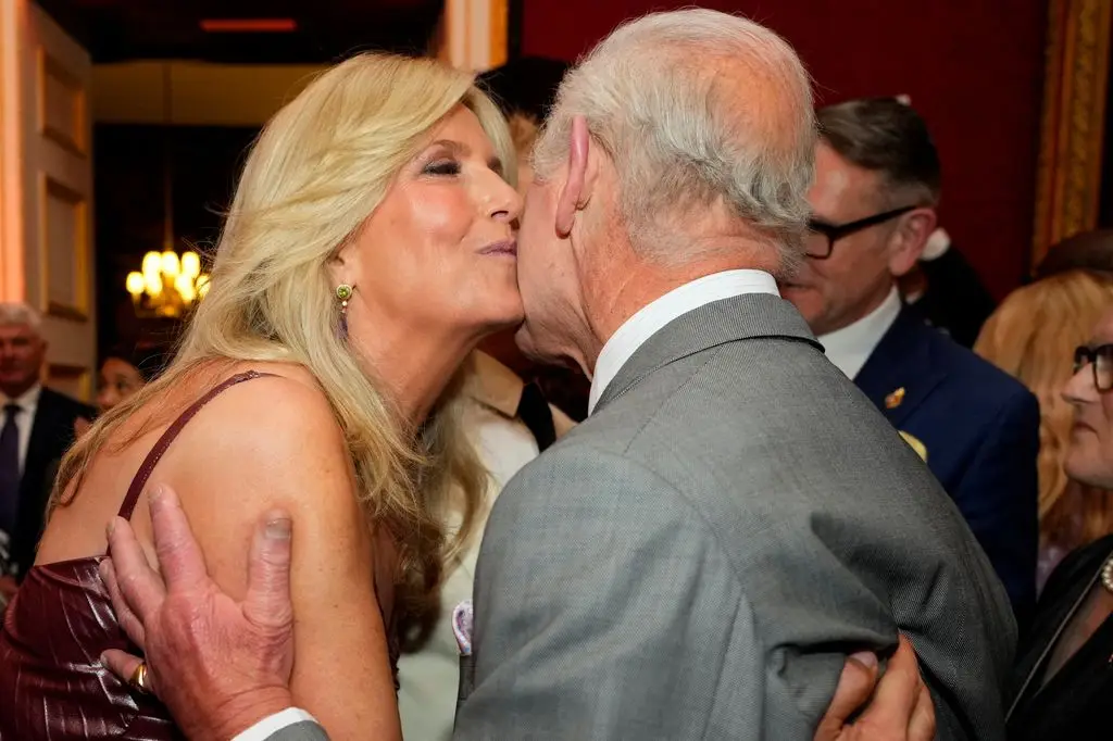 Penny Lancaster kisses King Charles