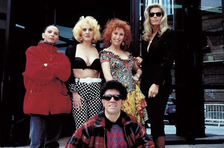 Pedro Almodóvar with his cast on the set of Kika.