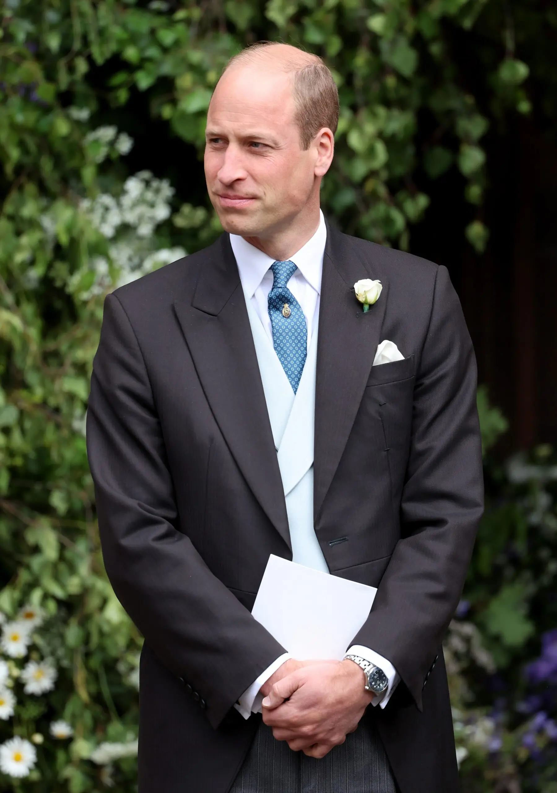 Image may contain Prince William Duke of Cambridge Blazer Clothing Coat Jacket Formal Wear Suit and Tuxedo