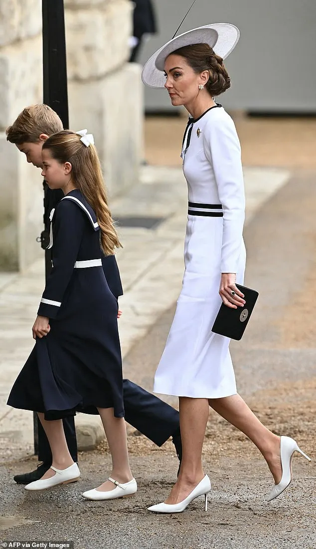 Kate, 42, was the picture of elegance and grace as she donned a crisp white structured pencil dress