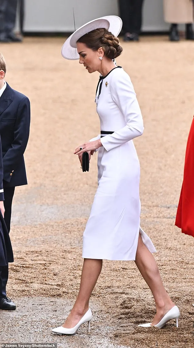 Kate arrives at Horse Guards Parade today as Trooping the Colour takes place