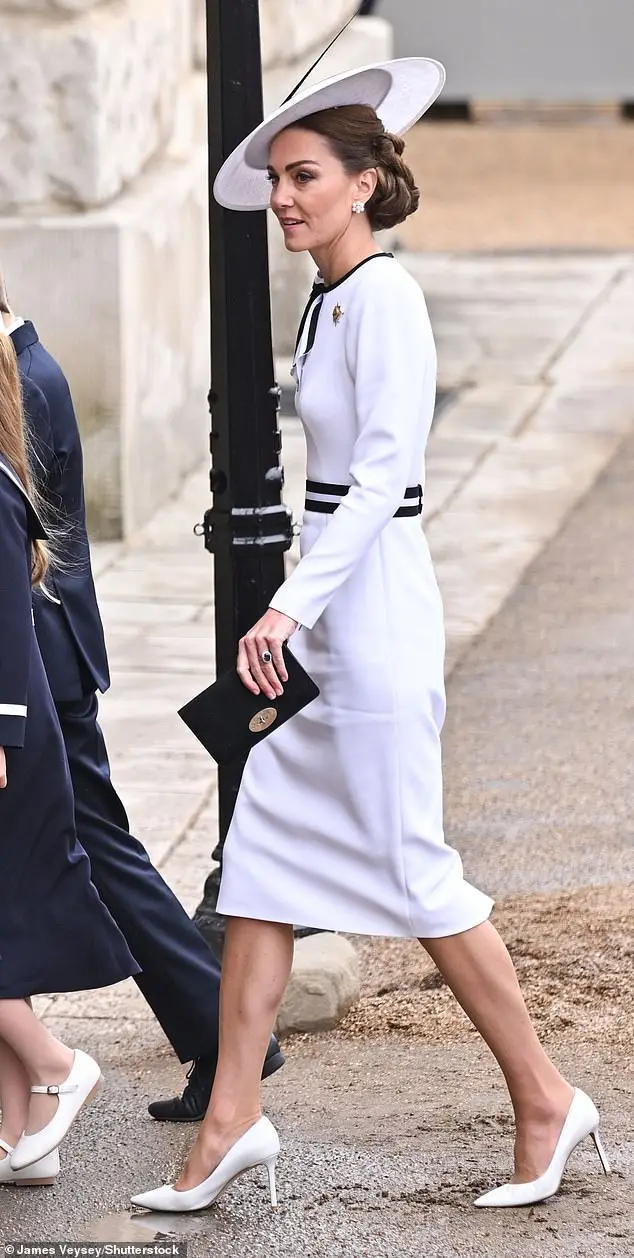 Kate's monochrome look was completed with Jimmy Choo heels (£650), a Mulberry clutch (£495) and Cassandra Goad pearl earrings (£5,620)