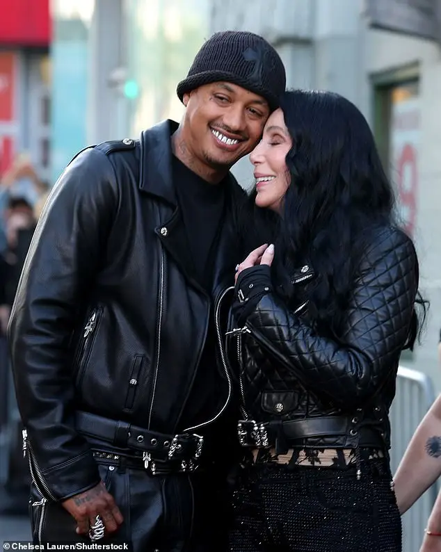 Cher was accompanied by her boyfriend, Alexander 'AE' Edwards and he also sported a black, leather jacket as well as leather pants