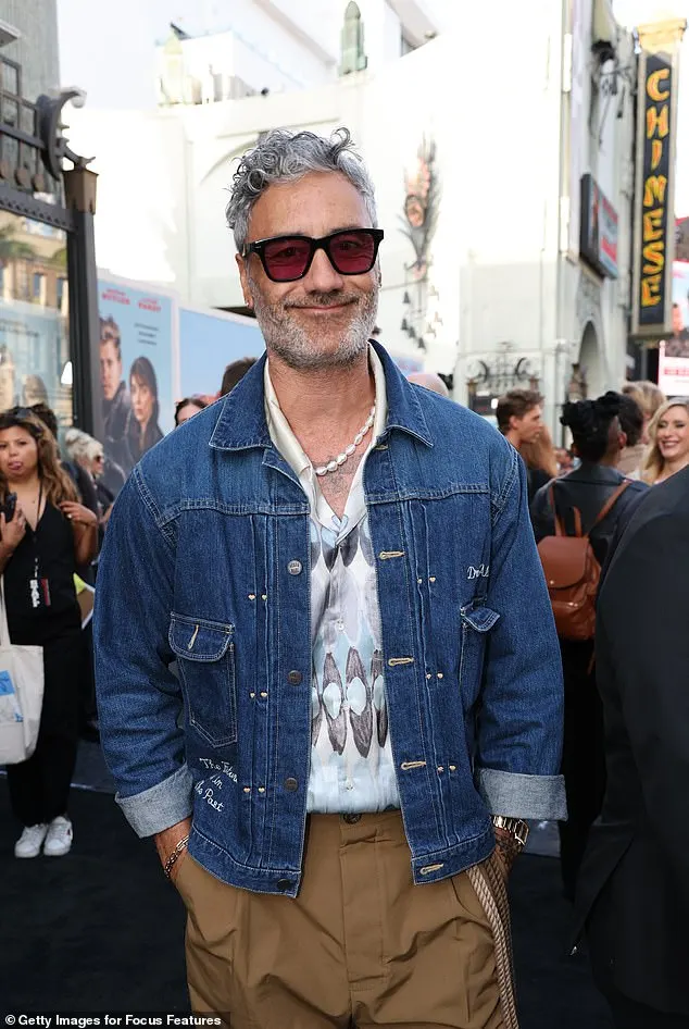 Taika appeared in high spirits as he flashed a smile while posing for the cameras