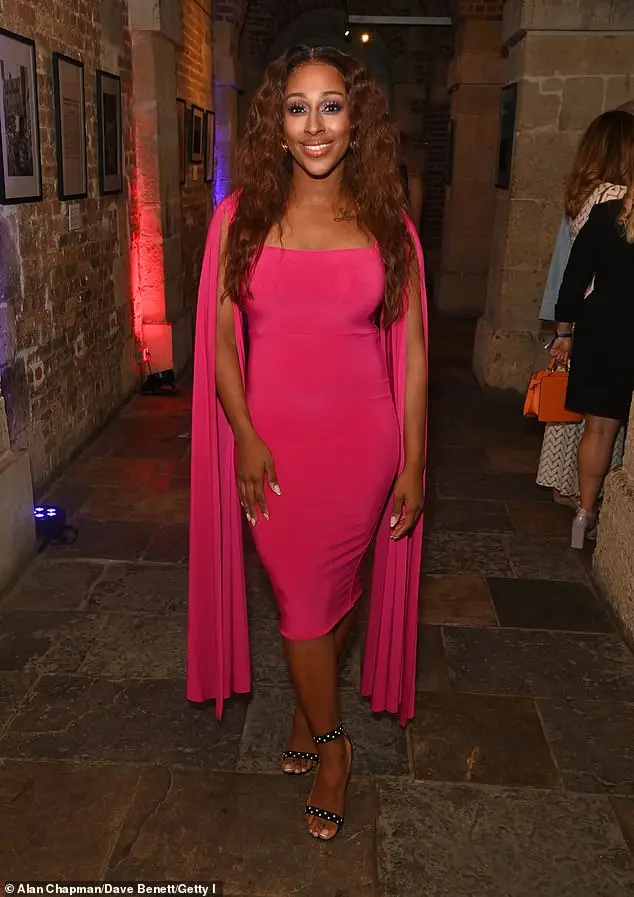 The X Factor winner, 35, plays Deloris Van Cartier in the show, had changed out of her stage costume and into a glamorous hot pink bodycon dress