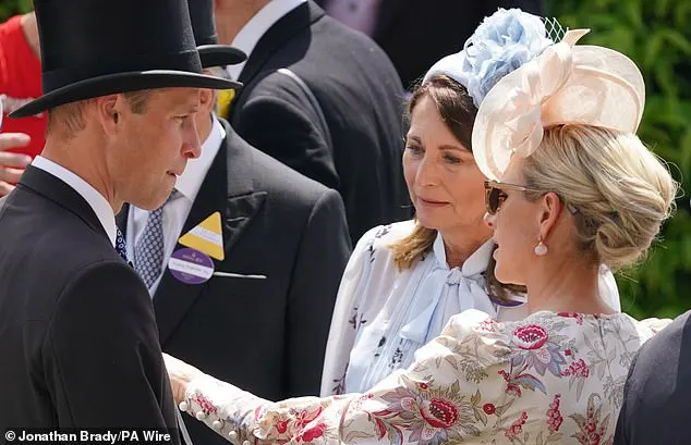 Prince William chats to his mother-in-law Carole Middleton and cousin Zara Phillips as the royals congregated for the second day of Royal Ascot