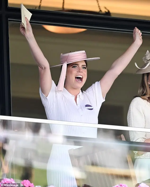 The thrill of the race! Eugenie throws her arms aloft as her horse comes first at Ascot