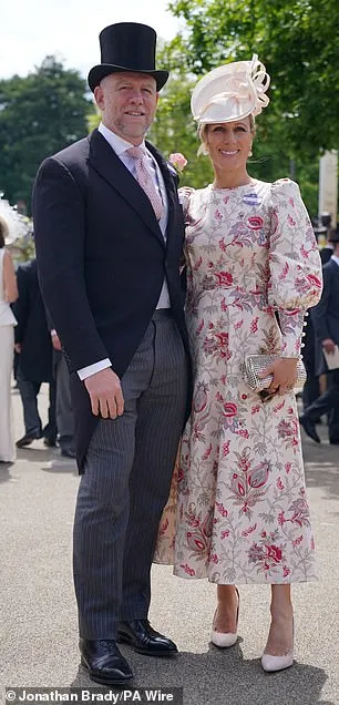 Blooming lovely! Zara opted for a cream dress with pink and purple floral details today