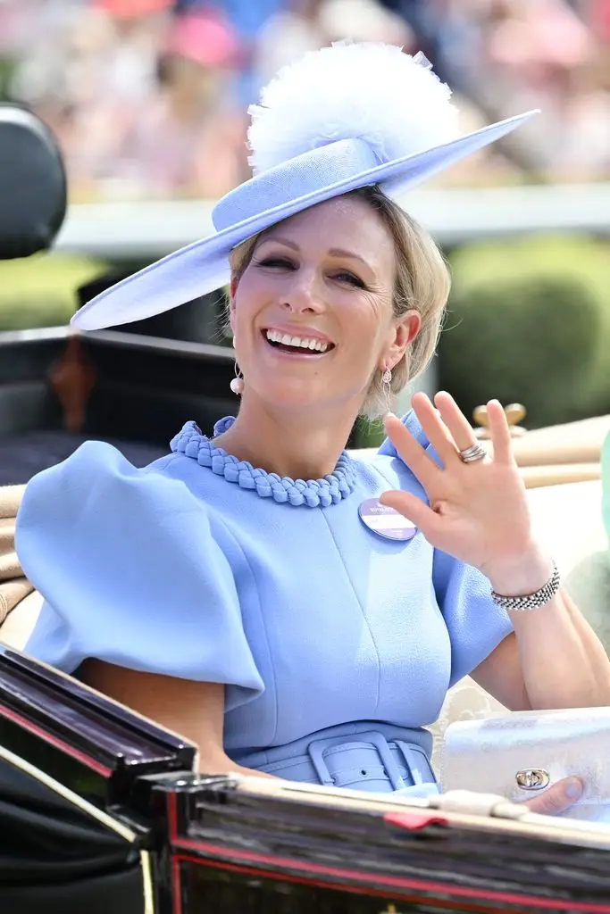 Zara donned a Cinderella-blue outfit as a royal charm.