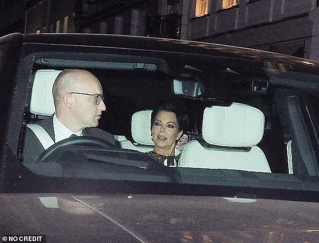 It had begun to rain so Kris was ushered quickly into the vehicle where she had a conversation with the driver