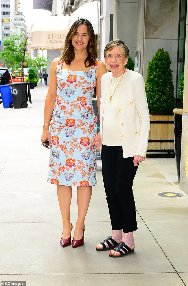 Jennifer Garner wowed in a blue floral dress as she posed with her mother Pat Garner in New York City on Monday