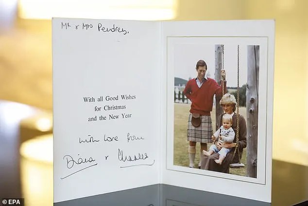 A 1983 signed holiday card from Princess Diana, featuring a picture with King Charles and a young Prince William