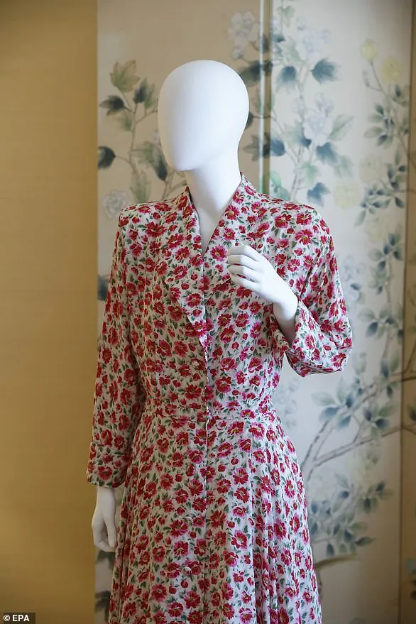 The pink floral silk shirt dress designed by Catherine Walker, which Diana wore to Prince William's sports day at Richmond Stadium in 1988 as well as leaving Prince Harry's school in Notting Hill in 1992