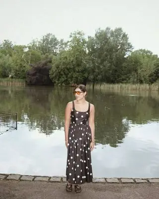 India wearing spot dress