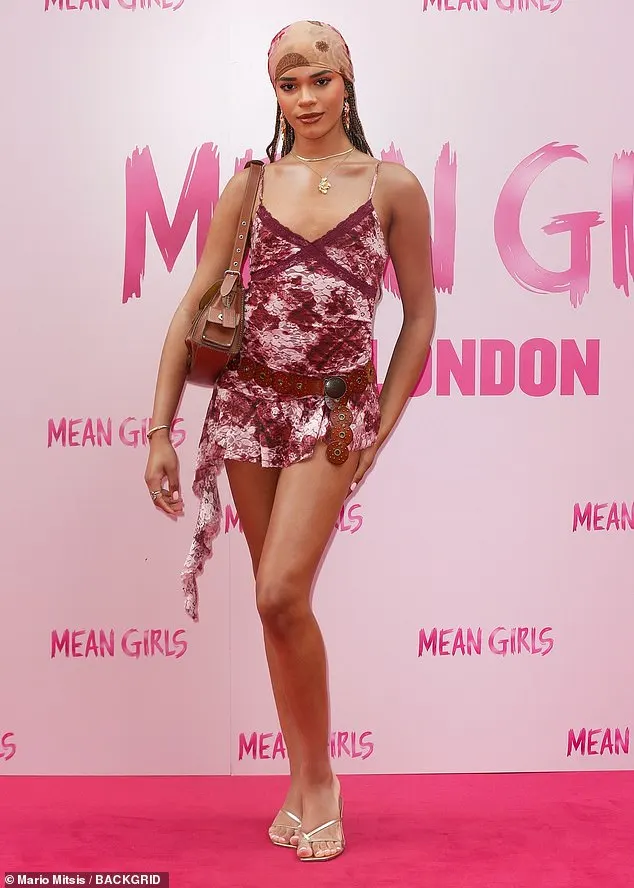 Heartstopper actress Yasmin Finney, 20, put on a leggy display in a rushed velvet minidress and waistbelt