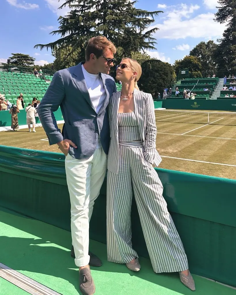 amelia spencer and husband courtside