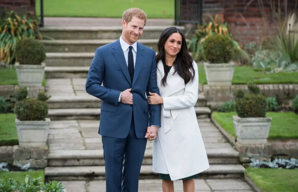 Prince Harry and Meghan Markle in a sunken garden in Kensington Palace