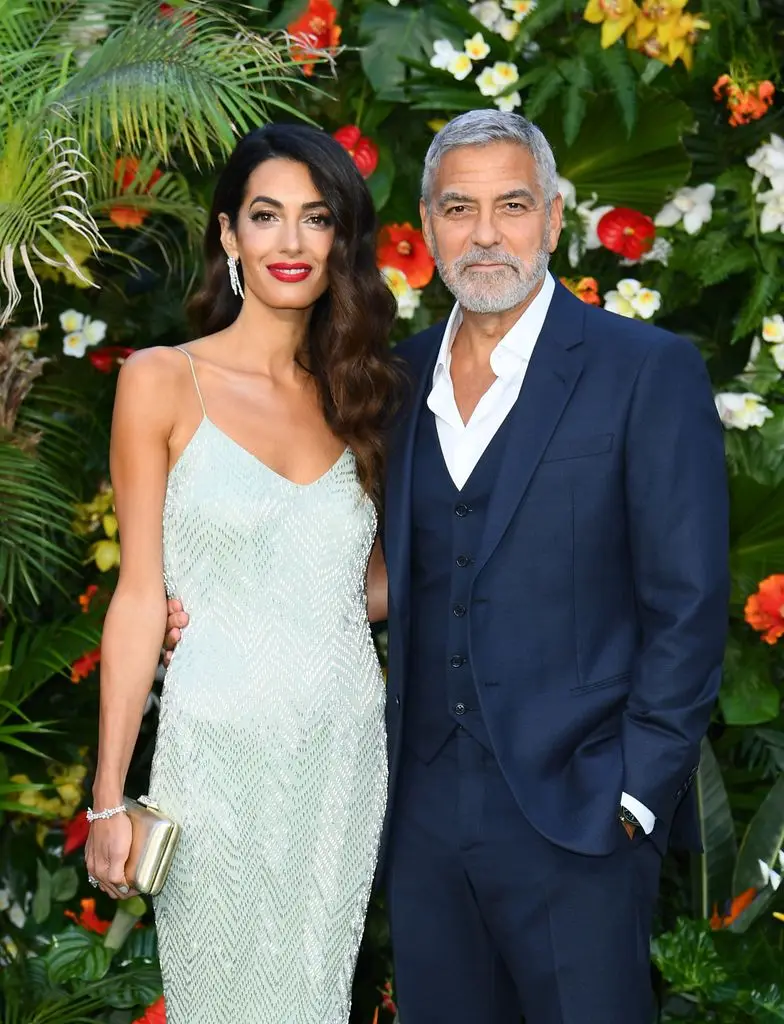 eorge and Amal Clooney attend the 