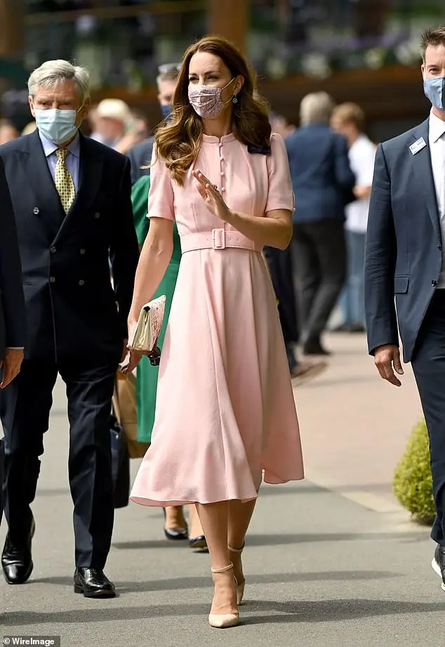 Kate debuted her blush 'Ahana' dress by Beulah at Wimbledon in 2021 with Aldo shoes, a Josef clutch and sparkling diamond earrings by Mappin & Webb. Above: Kate with her father Michael at Wimbledon in 2021 on the day of the men's singles final