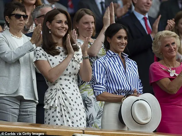 Kate and Meghan Markle got engaged at the All England Club in 2018 for the first time. Above: The pair watching the women's singles finals