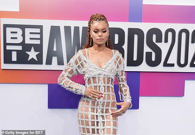 The Rise up singer also wore a pair of open-toed, strappy silver pumps and accessorized the look with long, dangly earrings as well as a variety of rings on each of her hands