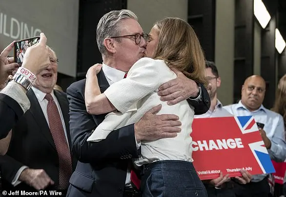 Lady Victoria Starmer shared a sweet kiss with her husband as Labour celebrated an historic electoral victory