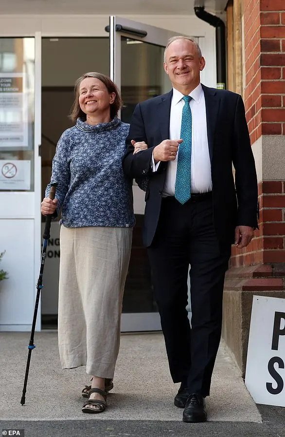 Ed Davey's partner Emily, who cares for their disabled son, went to the polling station to vote yesterday