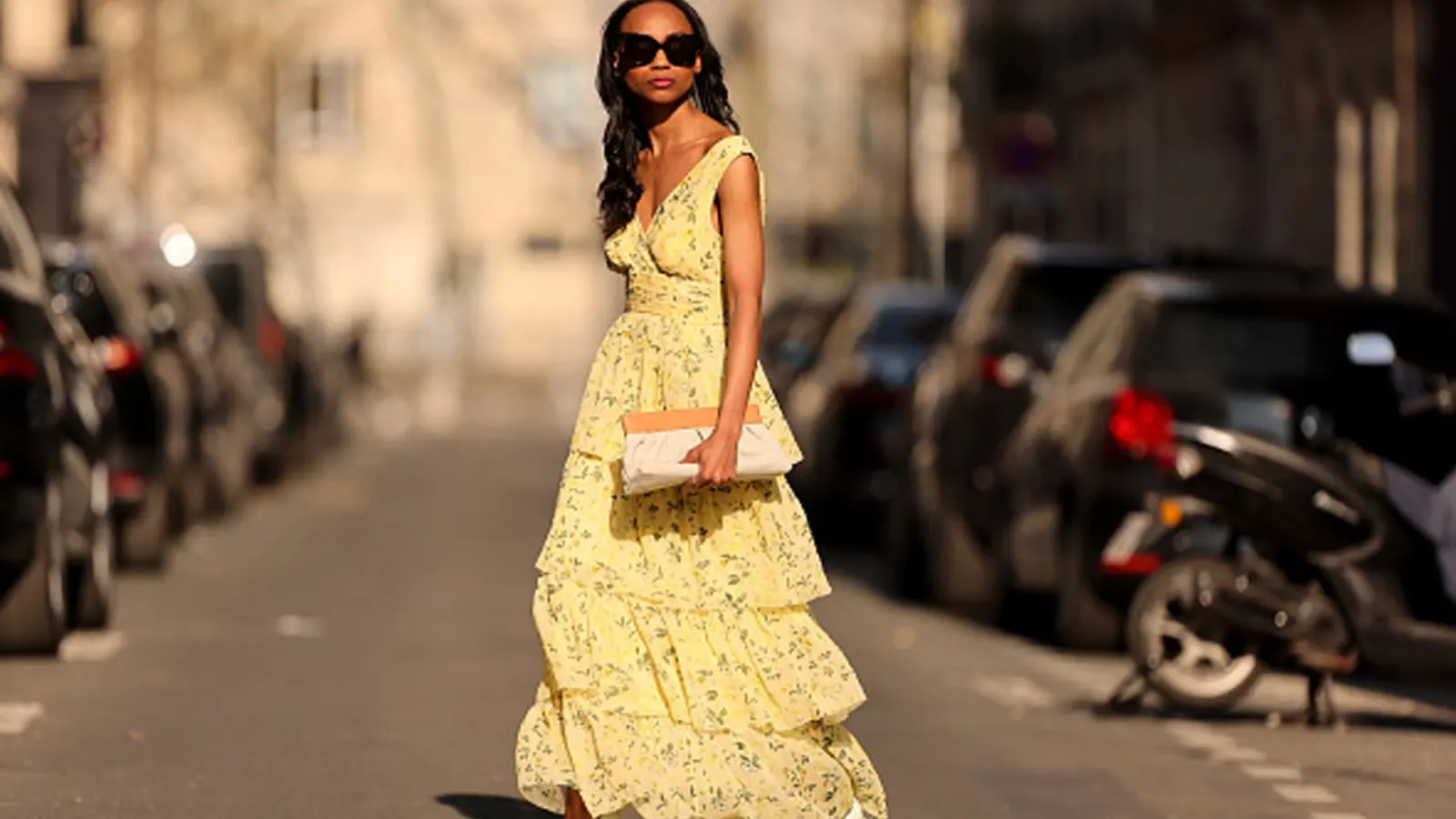 woman wearing yellow floral dress