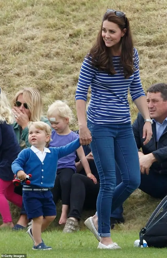 Pictured: The Princess of Wales wore a blue-and-white striped top by ME+EM to attend Prince William's polo match in July 2015