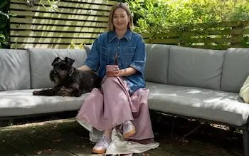 Hannah teams her wedding dress with a denim jacket and Adidas trainers